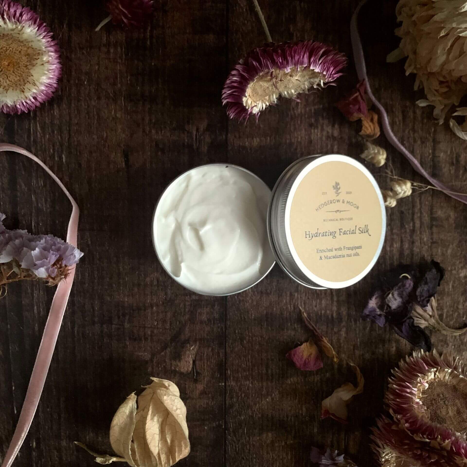 Open jar of Hydrating Facial Silk face cream showing smooth, rich texture — natural hydrating moisturiser for dry skin by Hedgerow & Moor.