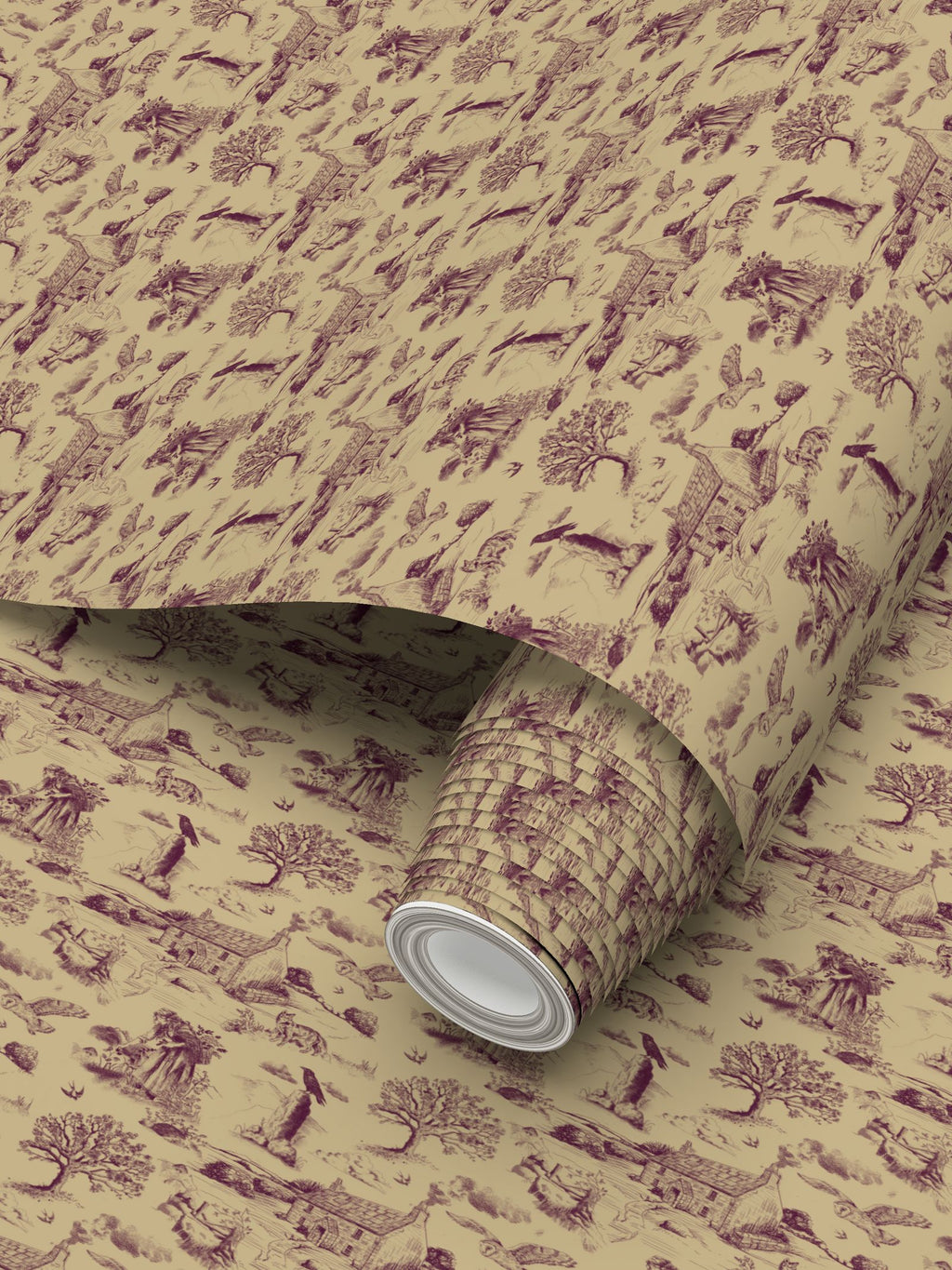 A roll of Hedgerow and Moor wallpaper with a classic Cornwall inspired toile de Jouy pattern in dark plum purple on a warm beige background, shown partially unrolled.