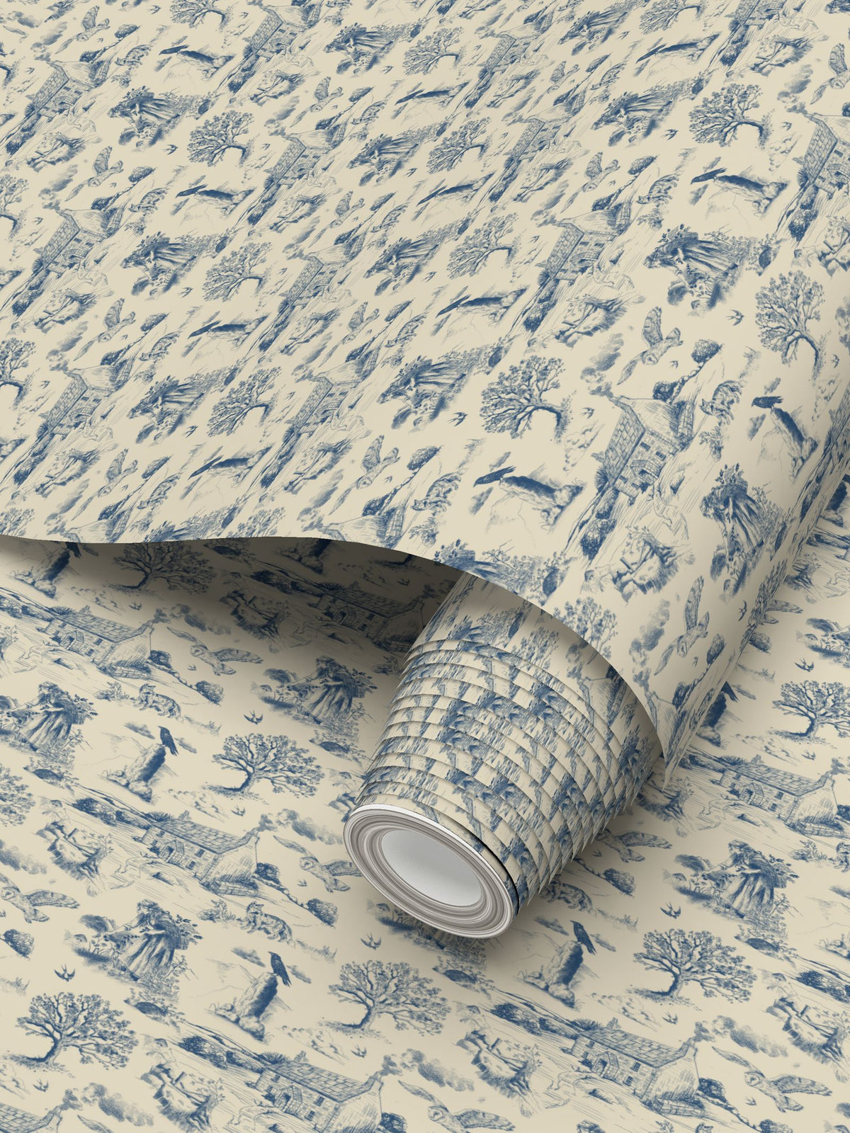 A close up of a roll of Traditional blue and warm ivory Cornish toile wallpaper with a stone farmhouse, fox, barn owl, ravens, swallows, trees and detailed moorland scenes.