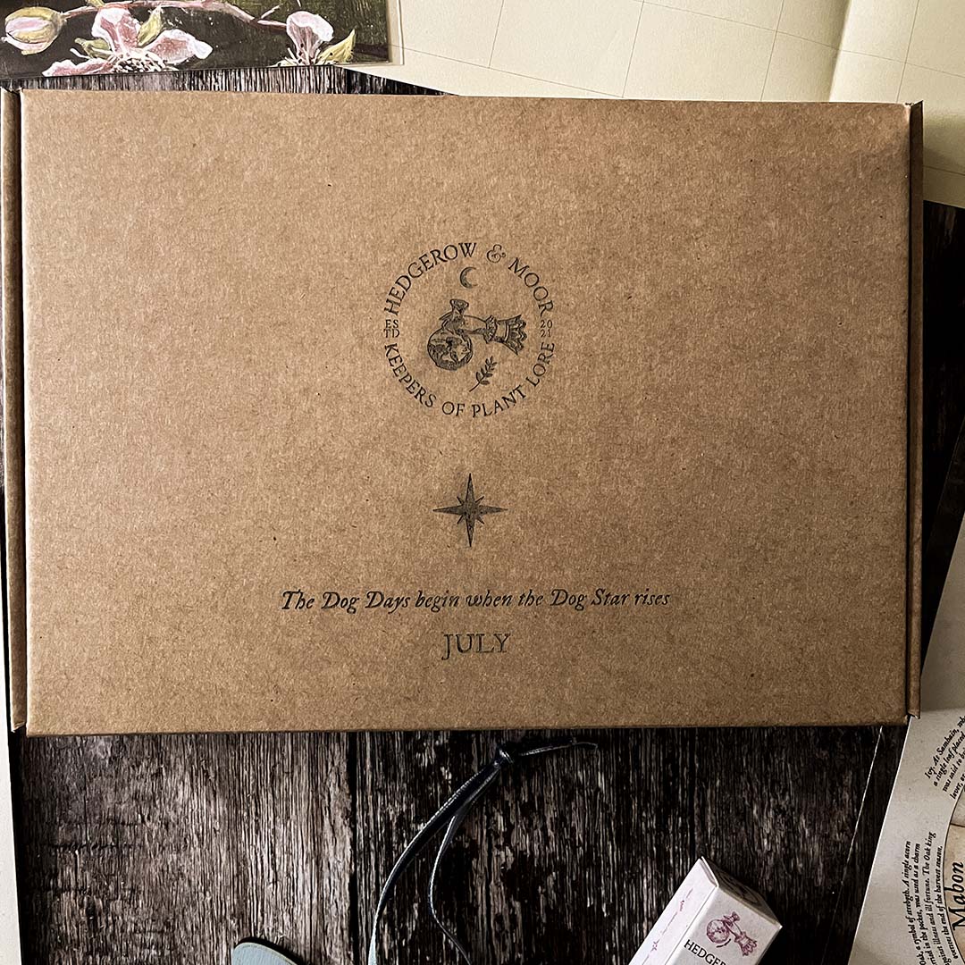 Brown Hedgerow and moor box with branding and text on a wooden surface