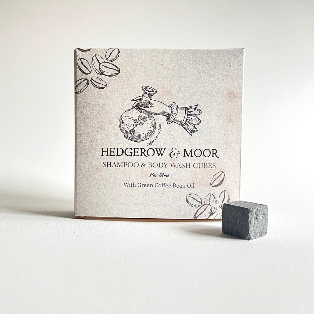Hedgerow & Moor plastic free shampoo and body wash cubes packaging with a single cube on a white background