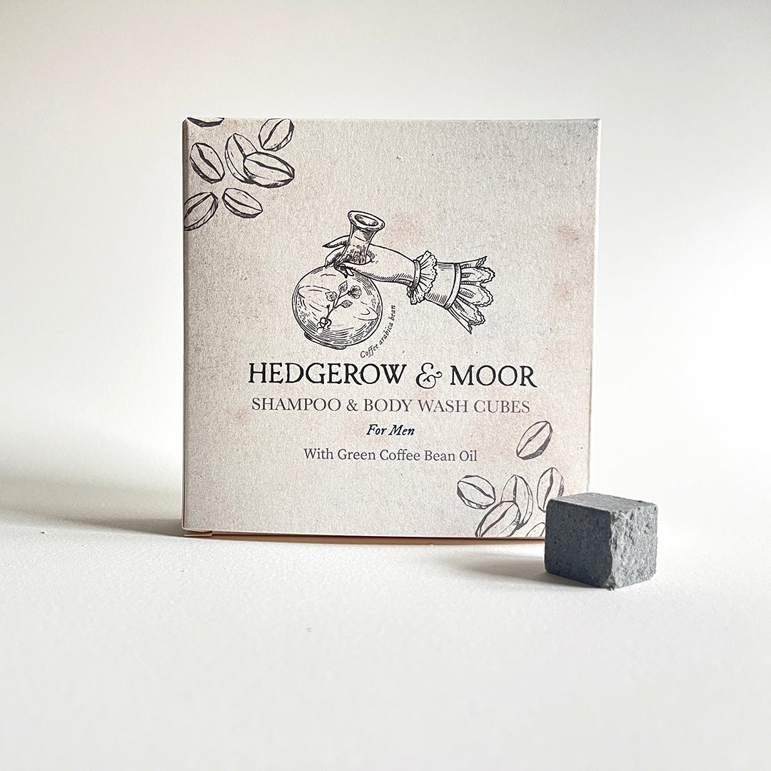 Hedgerow & Moor plastic free shampoo and body wash cubes packaging with a single cube on a white background