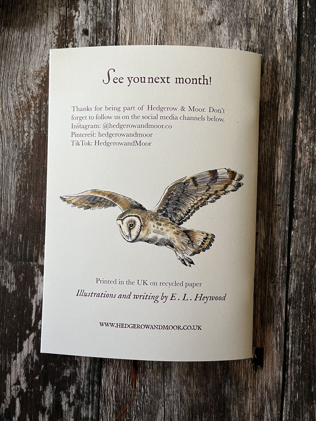 Back cover of the November Almanac with a flying barn owl illustration and writing and illustration credit to E. L. Heywood.