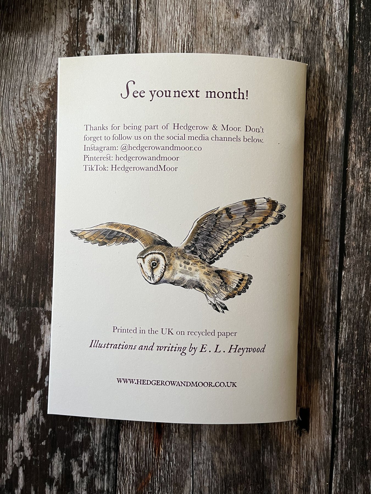 Back cover of the November Almanac with a flying barn owl illustration and writing and illustration credit to E. L. Heywood.